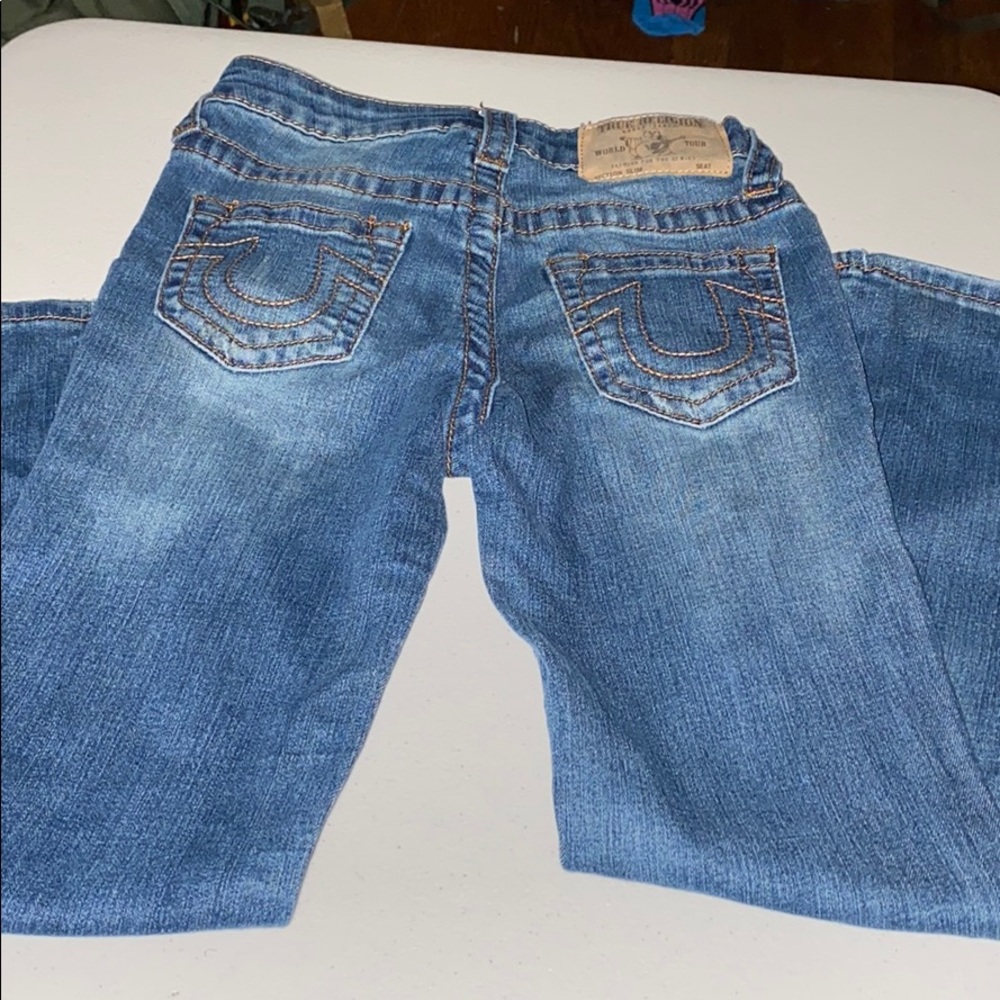 DISTRESSED TRUE RELIGIONS